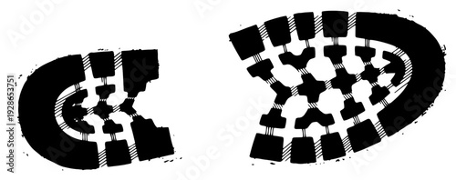 High contrast black and white footprints of a heavy boot sole with distressed grunge texture