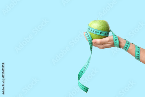 Female hand with fresh appl...