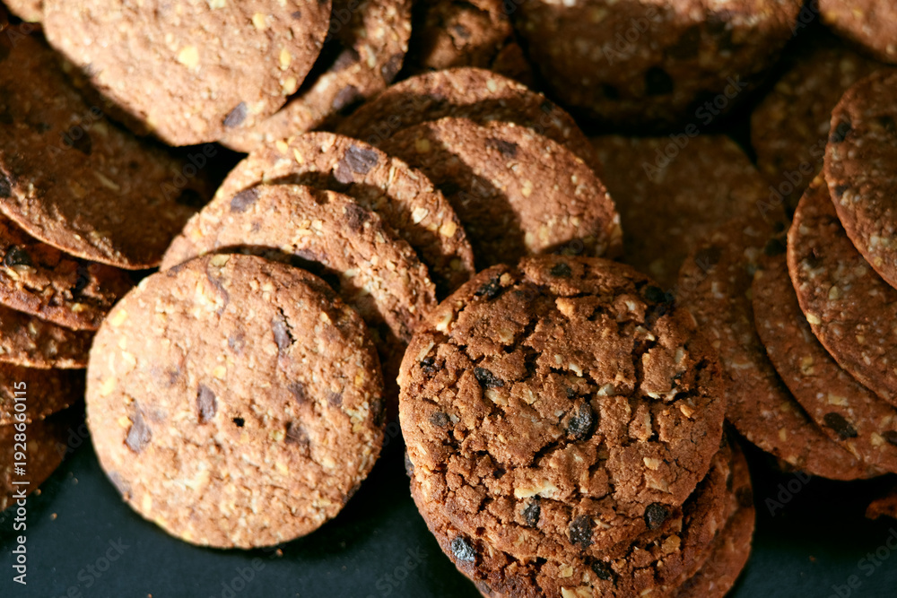 Fototapeta premium Close up texture of freshly baked chocolate chip cookies