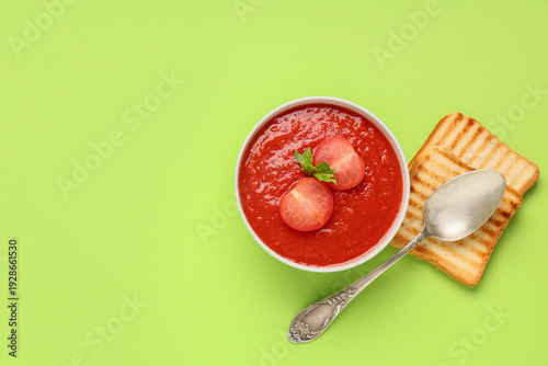 Bowl of tasty tomato soup a...