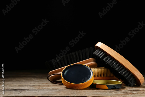 Shoe polish with brushes on...
