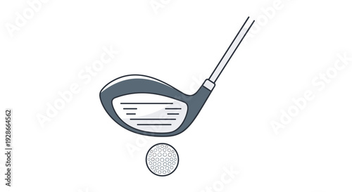 A dark gray golf club head with a silver striking face is positioned above a white dimpled golf ball on white background.