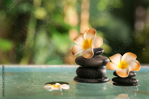 Lake with spa stones and be...