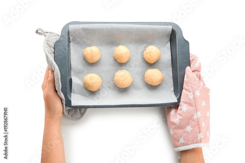 Woman holding baking dish w...