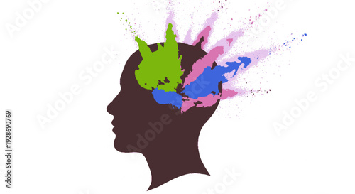 Creative thinking concept with colorful brain explosion in dark silhouette head