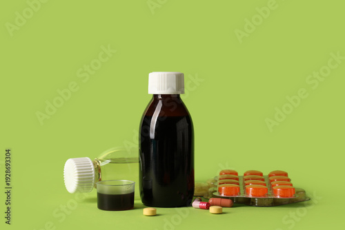 Bottles and measuring cup o...