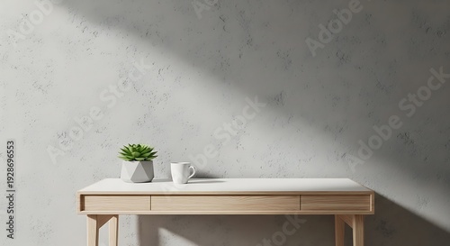 Minimalist wooden desk with white surface and small green plant in a modern room with concrete wall and natural light