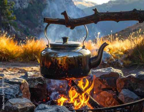 A rustic iron kettle hanging over an open fire