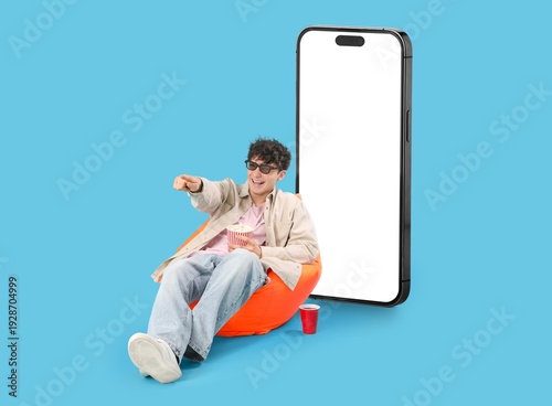 Young man in 3d eyeglasses,...