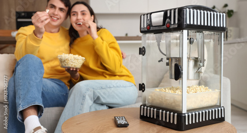 Cute couple watching movie ...