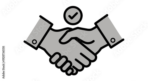 Two hands shaking in a gesture of agreement and partnership in a business context.