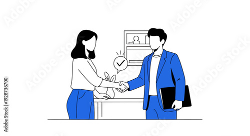 Two professionals shake hands across a desk in a modern office setting.