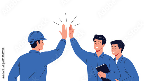 Group of happy industrial workers in blue uniforms celebrating a successful project completion with a friendly high five gesture at the site.