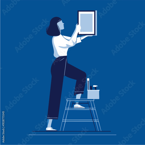 Person on a ladder holding a picture frame.