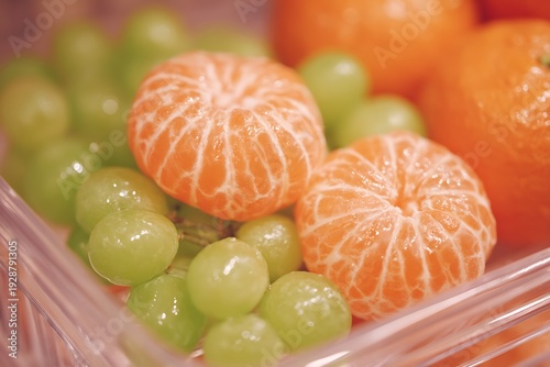 Wallpaper Mural Fresh peeled mandarin oranges and grapes. Torontodigital.ca