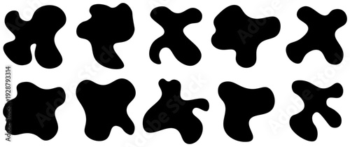 A set of abstract organic black shapes and amorphous blobs minimalist fluid ink blot silhouettes for graphic design