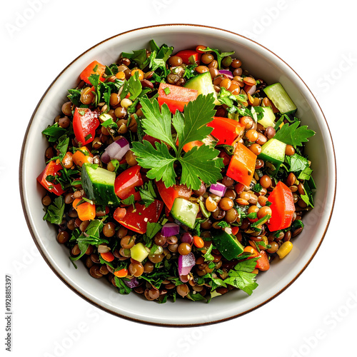 Delicious lentil salad with fresh vegetables in a ceramic bowl overhead view isolated on white background