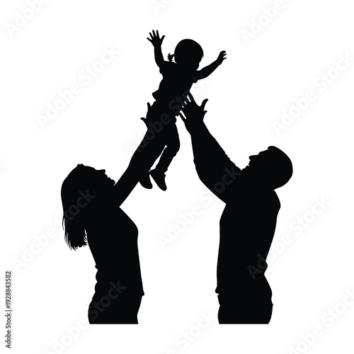 Happy family silhouette with parents tossing child in air