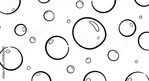 Abstract black and white bubbles pattern with various sizes and shapes
