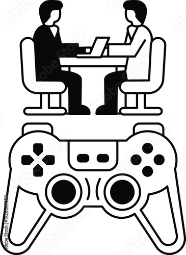 Two men sitting at a table with a laptop and a video game controller