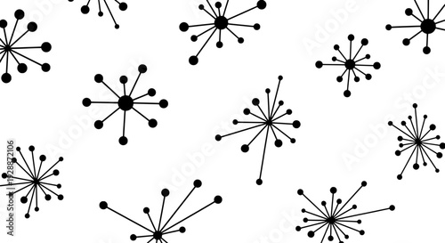 Black abstract designs resembling fireworks or explosions scattered across a plain background viewed from directly above