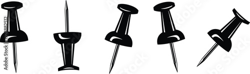 Five push pins with different head shapes and pointed ends arranged in a row black push pin office supply