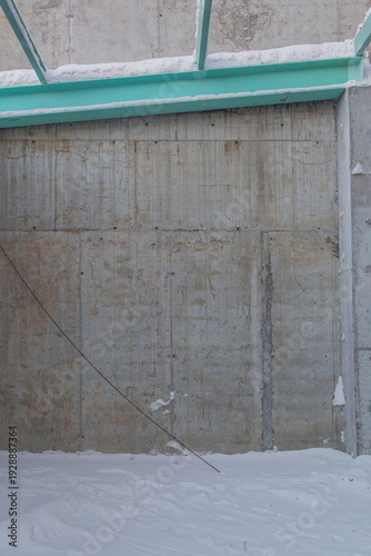 Wallpaper Mural Concrete wall under construction covered with snow in daylight Torontodigital.ca