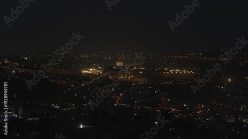 Wallpaper Mural Cinematic night view of the illuminated Old City walls, the Dome of the Rock, and the Temple Mount in Jerusalem. A peaceful look at the historic site sacred to Judaism and Islam. Torontodigital.ca
