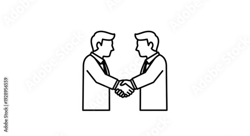 Two business professionals shaking hands in a gesture of agreement or partnership