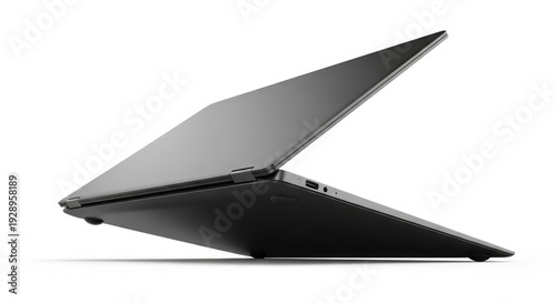 Sleek dark grey laptop, partially open, with visible ports, isolated on a clean white background.