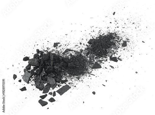 Φωτογραφία Black charcoal particles isolated on a white background, activated charcoal powder