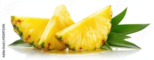 The Pineapple Slices on Leaves with Fresh Juice on White Background