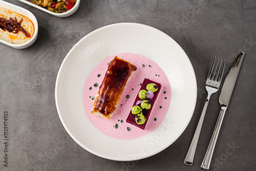 Artistic fine dining dessert plate with modern gourmet presentation