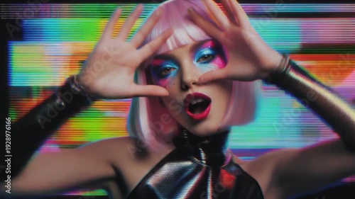 Woman with pink hair and makeup.