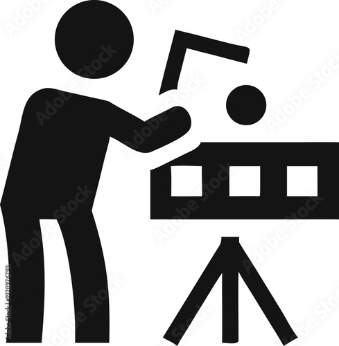 Filmmaker directing a scene with a camera on a tripod and using a clapperboard