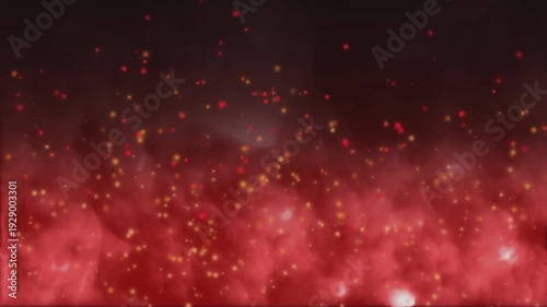 Vibrant red and gold sparkling particles on dark background creating magical atmosphere