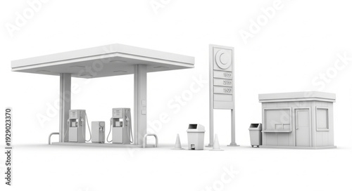 Gas station structure with fuel pumps and canopy in bright daylight.