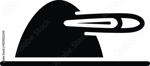 A black illustration of an iron and paperclip on a flat surface, wqe 207