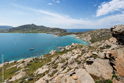 View of the rocky, lush and hilly Paros Park and the Aegean Sea on Paros island in Greece viewed from above on a sunny day.