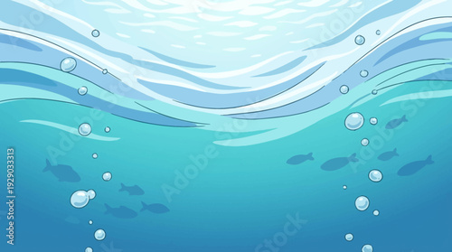 An underwater perspective looking up at ocean surface gentle wave shapes clear blue water calm marine environment clean open composition