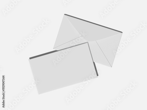 A close-up of two sleek, blank white business cards floating against a plain white background