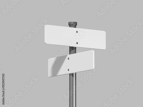A signpost with two blank white signs on a gray background