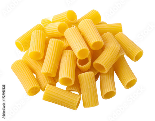 A pile of ribbed, tubular, yellow pasta pieces against a black background