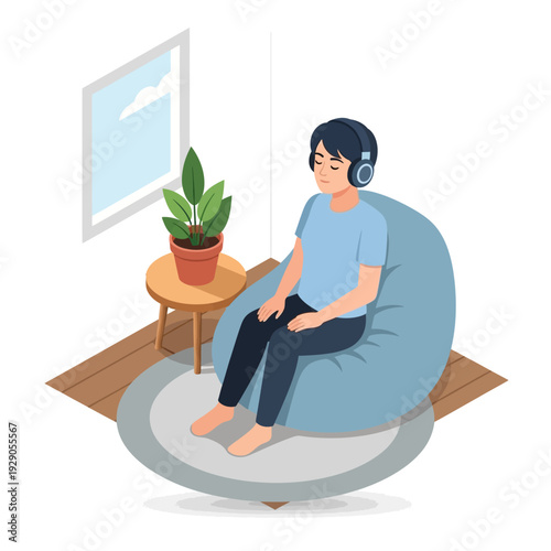 A person relaxing on a bean bag chair with headphones.