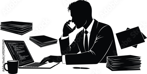 Businessman working at desk with laptop and paperwork