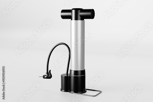 A sleek, silver and black manual hand pump with a T-shaped handle and curved hose