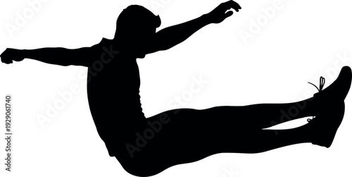 Silhouette of a person jumping in the air with arms and legs outstretched