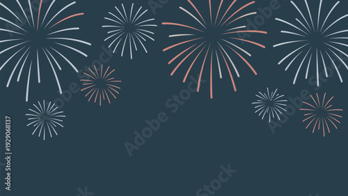 A vibrant display of colorful fireworks exploding in the dark night sky with bursts of red and white light