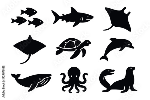 set of hand drawn black silhouette sea animals icons including fish shark manta ray turtle dolphin whale octopus and sea lion