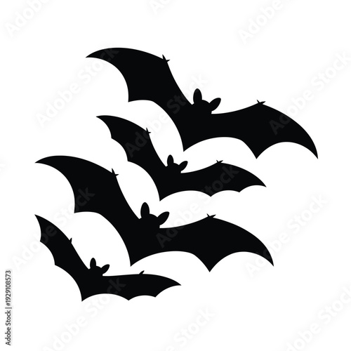 A group of black bats in flight against a white background